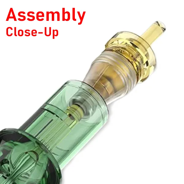 Close-up of tattoo cartridge assembly showing housing and plunger