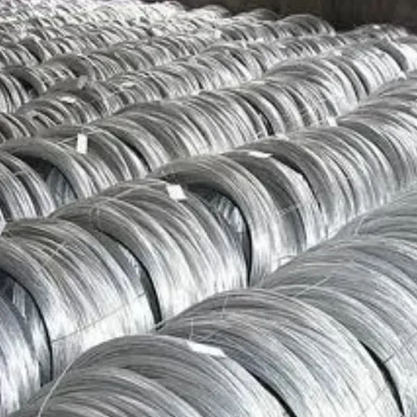 Large rolls of stainless steel wire stored in factory before being drawn down for tattoo needle manufacturing
