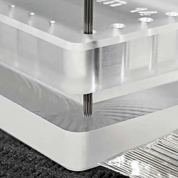 Tattoo needle jig holding stainless steel needles for round configuration manufacturing process