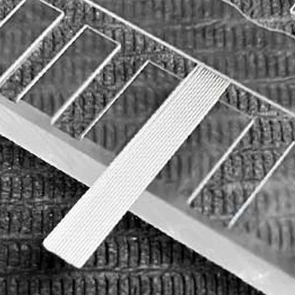 Tattoo needle jig used for aligning stainless steel needles in magnum configuration manufacturing