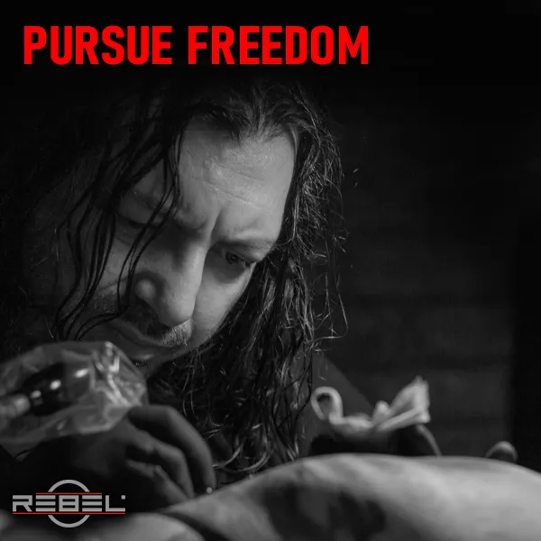 Caesar The Hun tattooing — rebellious tattoo artist in action, pursuing freedom in artistic expression