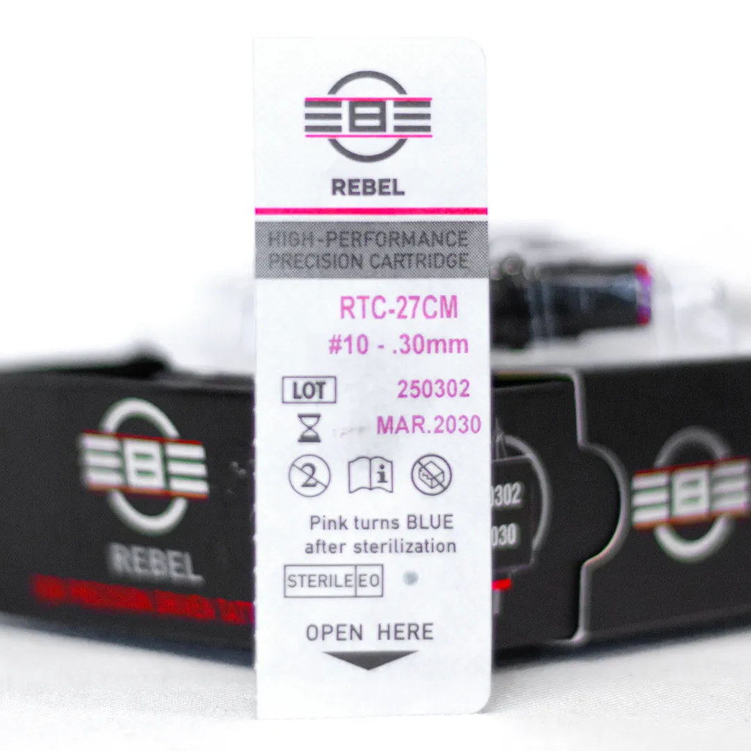 REBEL 27 Curved Magnum tattoo needle retail box with open drawer, cartridge and blister pack showing RTC coding, gauge, and details