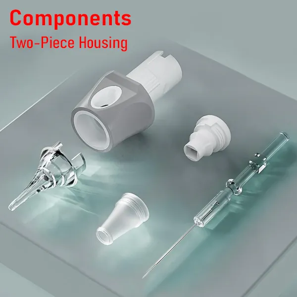 Tattoo cartridge components with two-piece gray housing, clear tip, plunger, and membrane cap.