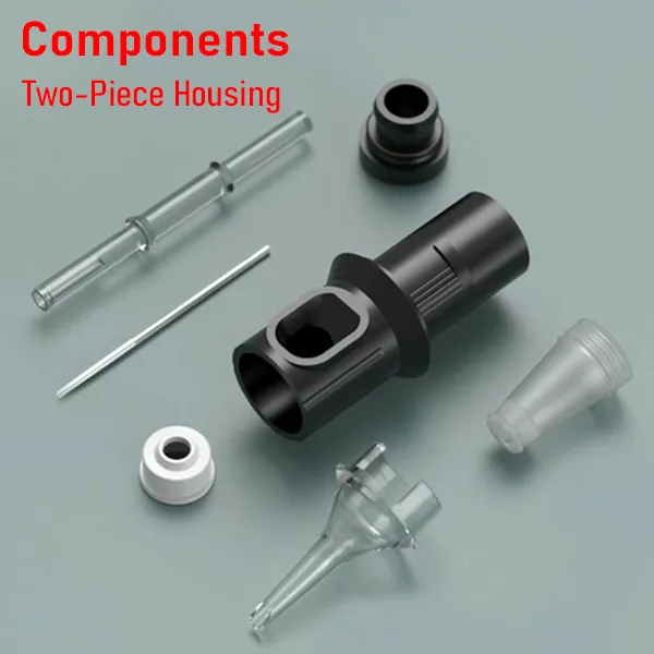 Tattoo cartridge components with two-piece black housing, plunger, membrane cap, and needle head.
