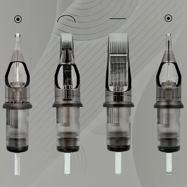 Four tattoo cartridges in a row with translucent gray housings and clear tips
