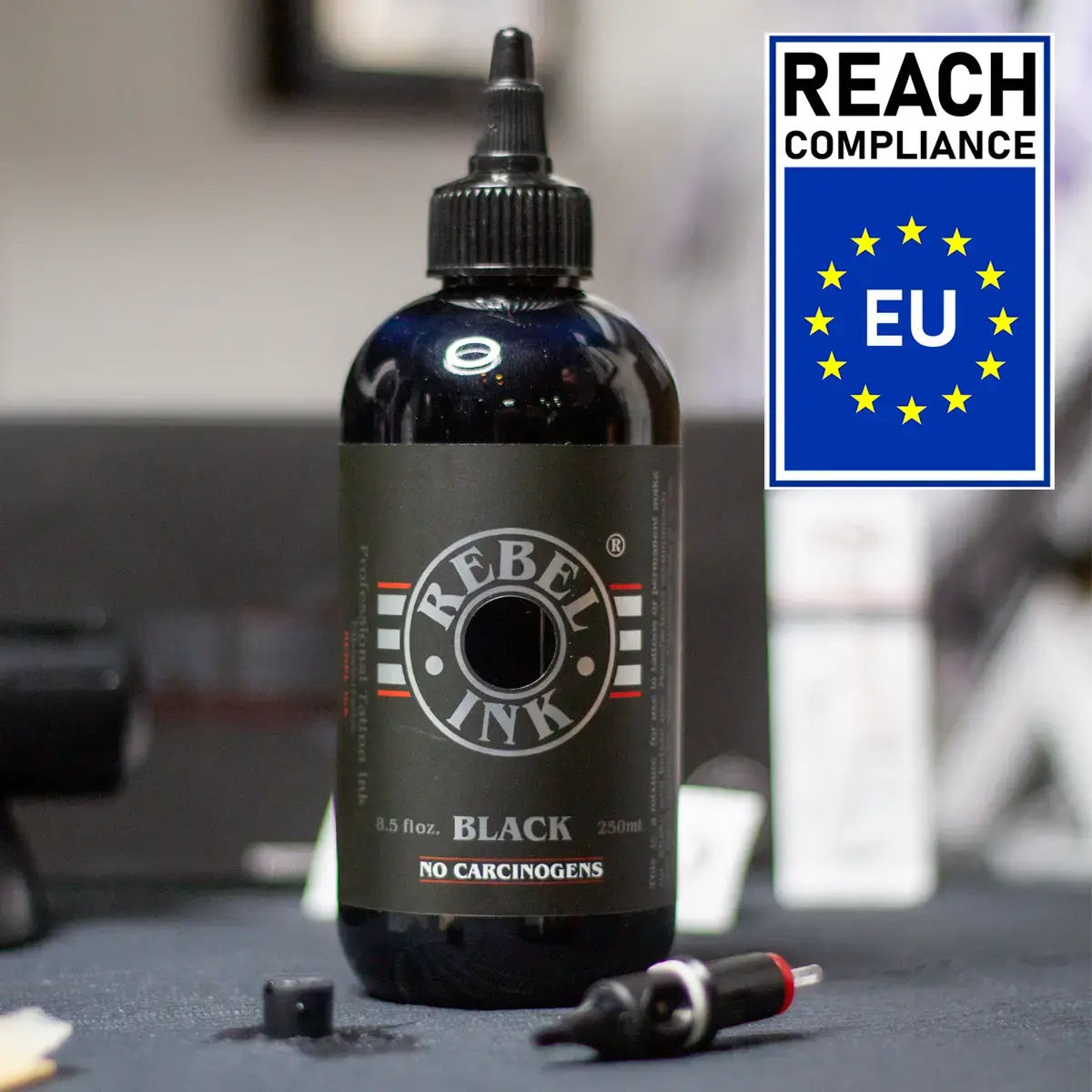 REBEL Black Tattoo Ink 8.5 oz bottle with EU REACH compliance label for professional tattooing