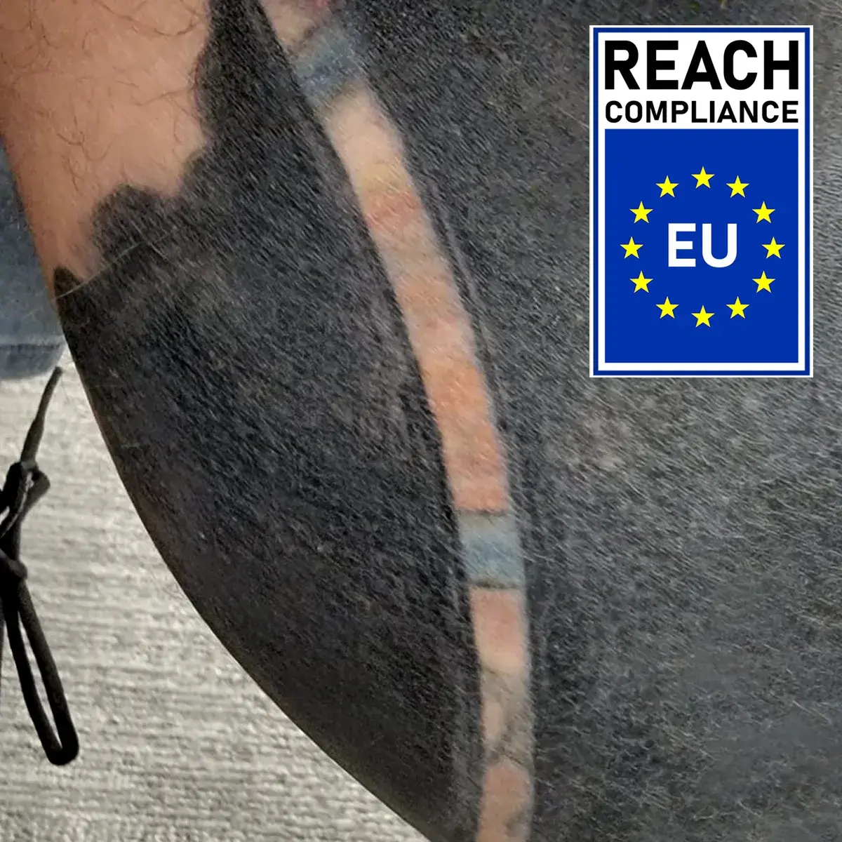 REBEL black ink tinting power test showing the capability of the ink for cover-up and black-out tattoos with EU REACH COMPLIANCE badge.