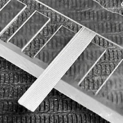 Tattoo needle jig used for aligning stainless steel needles in magnum configuration manufacturing