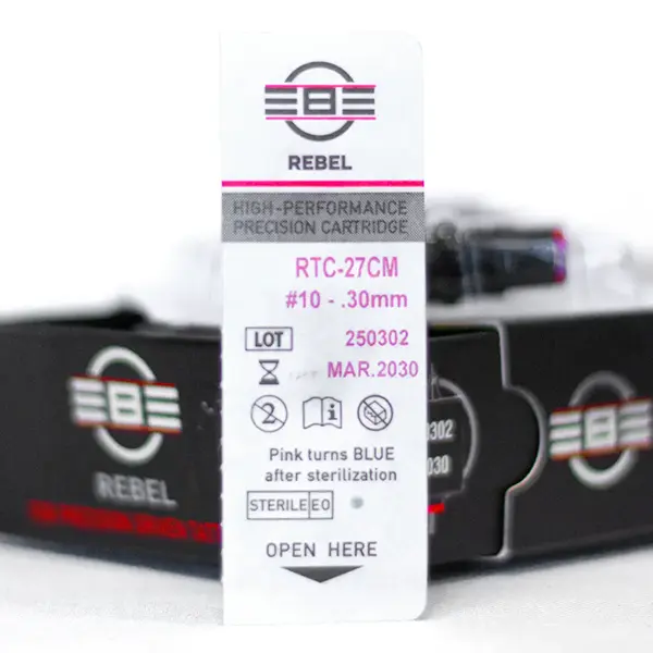 REBEL 27 Curved Magnum tattoo needle retail box with open drawer, cartridge and blister pack showing RTC coding, gauge, and details