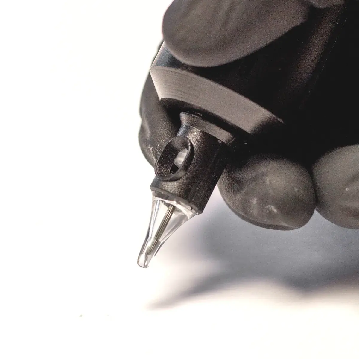 REBEL Precision Round Shader tattoo cartridge installed in tattoo machine ready for use