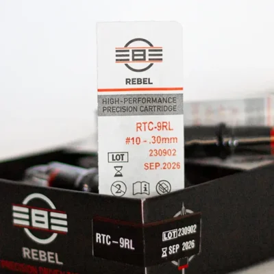 REBEL Precision standard 9RL tattoo cartridge blister pack close-up — RTC-9RL, #10 gauge 0.30mm, EO sterilized