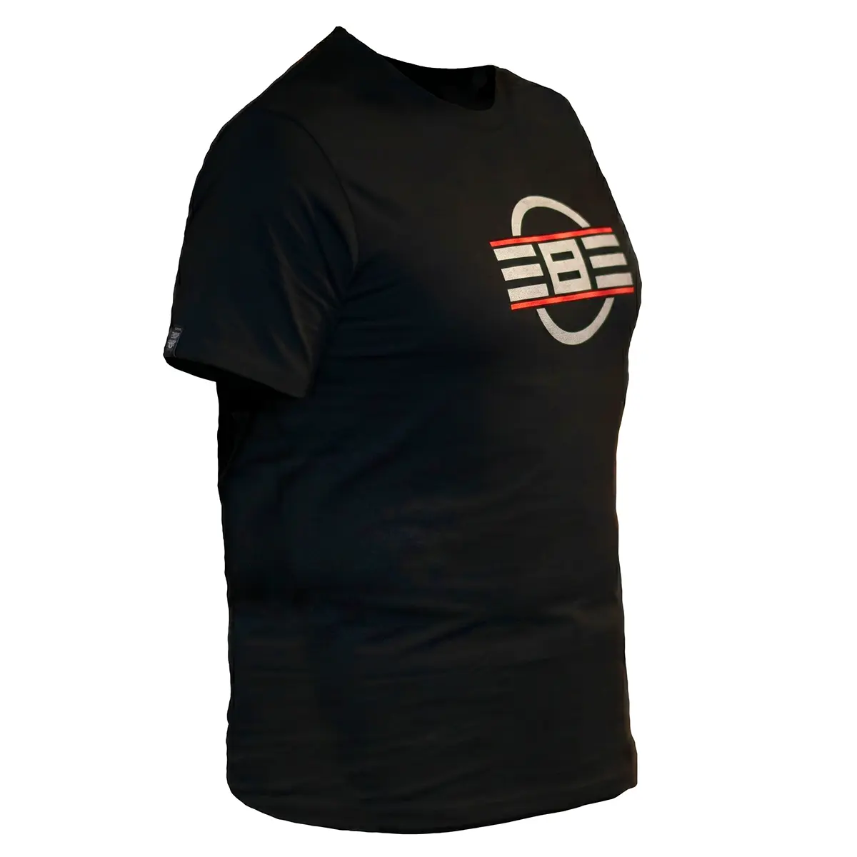 REBEL Precision Tee in black, right front angle view, bi-color REBEL logo on chest