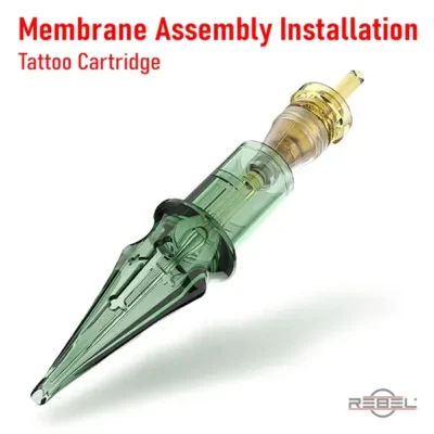 Tattoo cartridge membrane assembly being installed into green one-piece housing with yellow membrane cap visible by REBEL