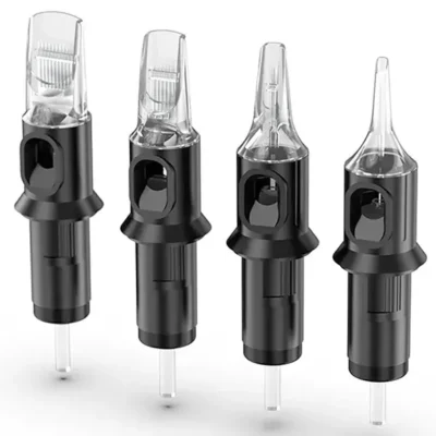 Four tattoo cartridges showing needle type variations: round liner, round shader, regular magnum, and curved magnum in black housing with clear tips