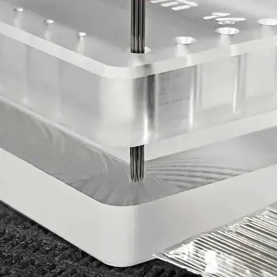Tattoo needle jig holding stainless steel needles for round configuration manufacturing process