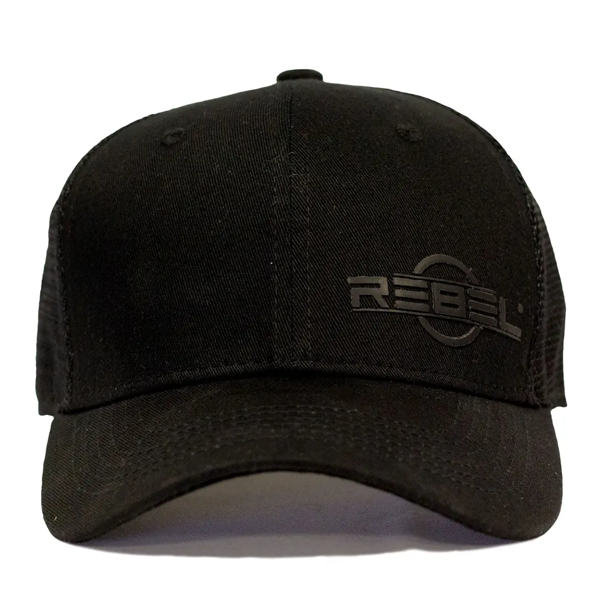 REBEL Phantom Trucker Hat front view, raised black rubber REBEL logo off-center on structured cotton panel, curved visor