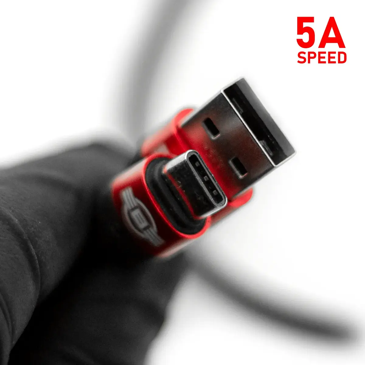 REBEL 5A USB-C charging cable connector heads, angled action shot