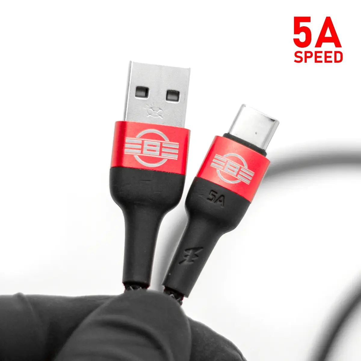 REBEL 5A USB-C charging cable, both connector ends held in hand