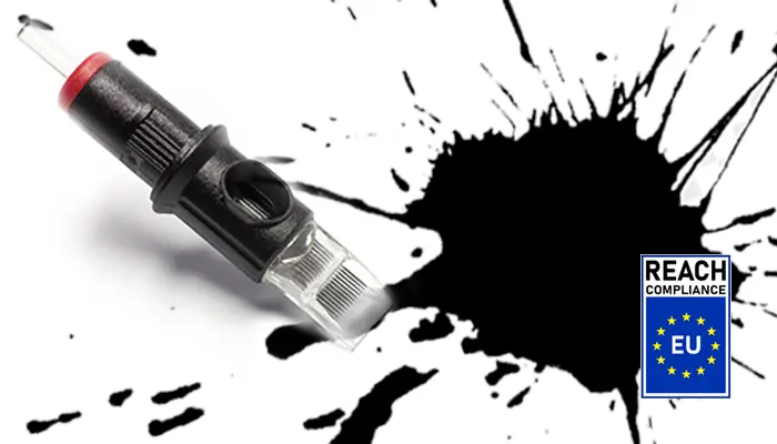 Tattoo cartridge needle with black ink splatter and REACH compliance EU badge