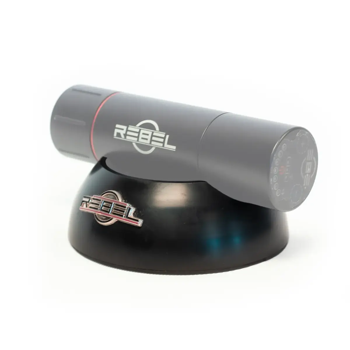 REBEL tattoo machine holder with grip resting in base, rear right angle