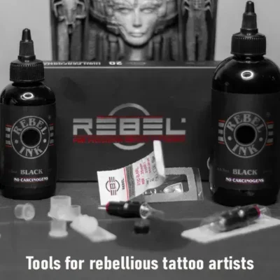REBEL Black Ink bottles, precision cartridges, and cartridge box — tools for the rebellious tattoo artist